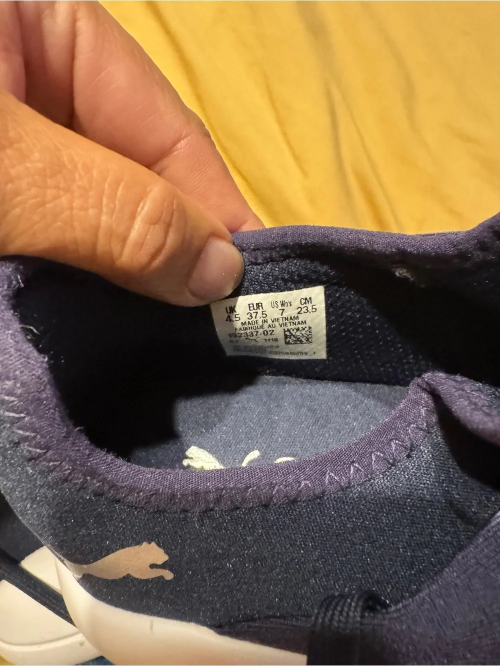 Puma women Navy and White Slip-On Knit Sneakers